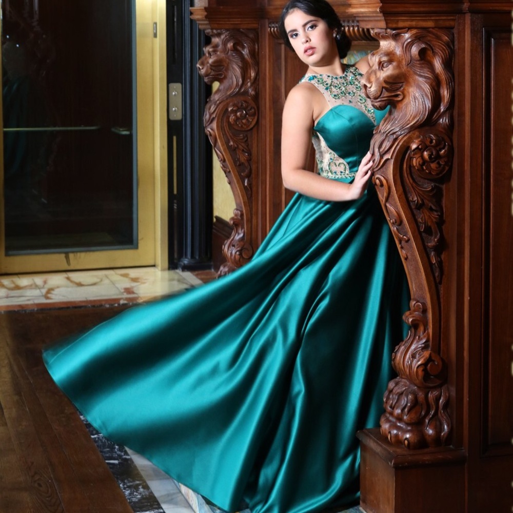 Long emerald green beaded ball gown